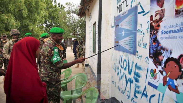 KDF TROOPS IN SOMALIA DONATE DESKS AND FOOD TO LOCALS IN CELEBRATION OF KDF DAY