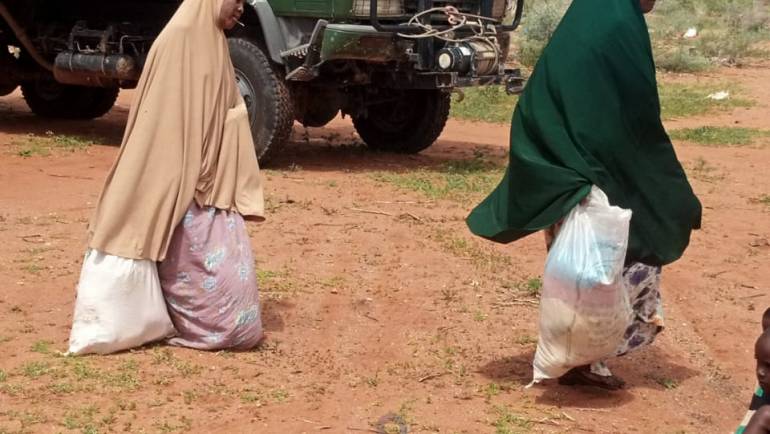 KDF TROOPS SHARE FOOD AND OFFER MEDICAL SUPPORT TO LOCALS AT GHERILLE