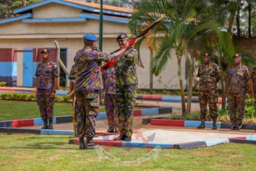 CDF HANDS OVER FLAG TO KDF GOLF TEAM
