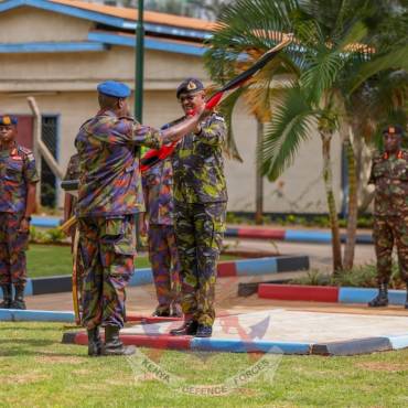 CDF HANDS OVER FLAG TO KDF GOLF TEAM