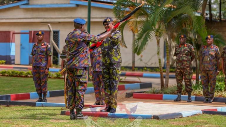 CDF HANDS OVER FLAG TO KDF GOLF TEAM