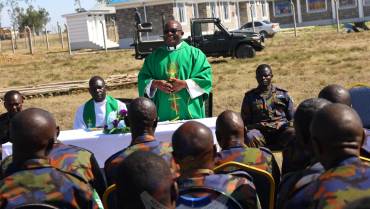 PRINCIPAL CHAPLAIN OFFICIATES BLESSING OF NEW CHURCH SITE AT NAROK FORWARD OPERATING BASE