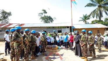 KENYAN PEACEKEEPERS URGE EDUCATION OVER GUNS AT KARTUSI SECONDARY SCHOOL