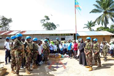 KENYAN PEACEKEEPERS URGE EDUCATION OVER GUNS AT KARTUSI SECONDARY SCHOOL