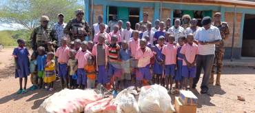 REINFORCING EDUCATION AND COMMUNITY TRUST THROUGH CIVIL-MILITARY COOPERATION