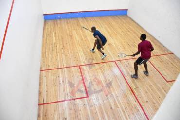 SERVING FITNESS, FORGING UNITY THROUGH SQUASH