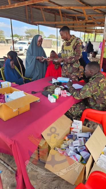 KDF TROOPS EXTEND MEDICAL CARE AND FOOD SUPPORT
