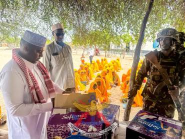 KDF TROOPS STRENGTHEN COMMUNITY TIES